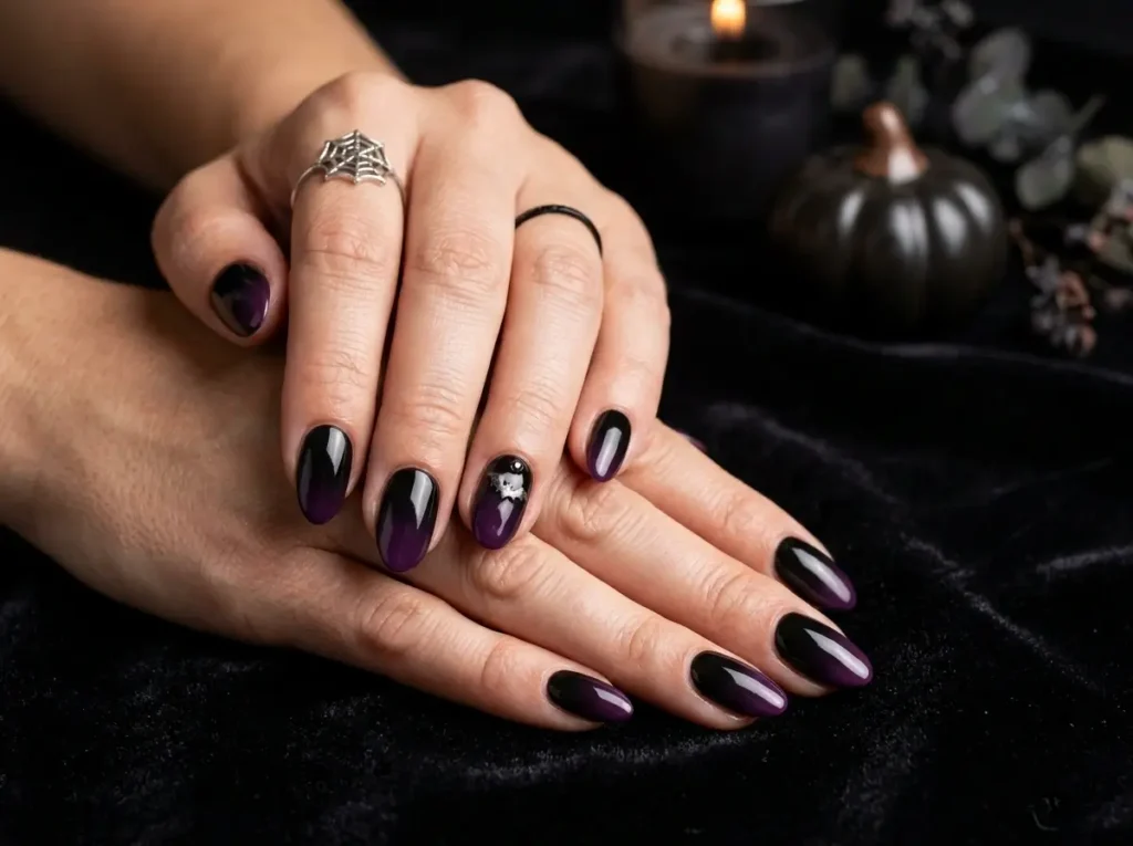 20 Spooky Nail Designs for Halloween 2026: Creepy, Dark & Haunting Ideas 12 dark black and deep purple gothic ombre Halloween nails