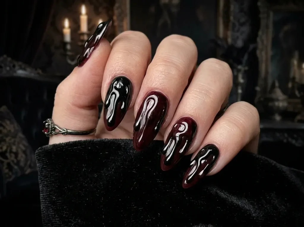 20 Spooky Nail Designs for Halloween 2026: Creepy, Dark & Haunting Ideas 4 gothic Halloween nails with dark melting wax candle nail art