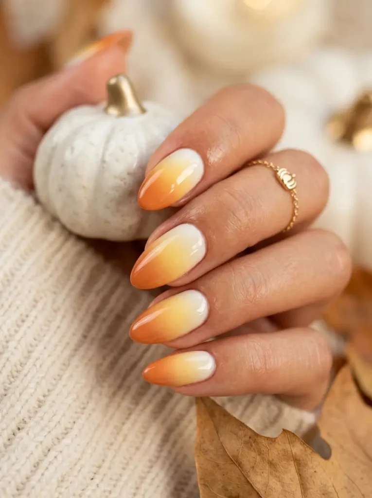 Halloween Nails 2026: 30+ Cute, Classy & Spooky Designs 3 candy corn ombre Halloween nails