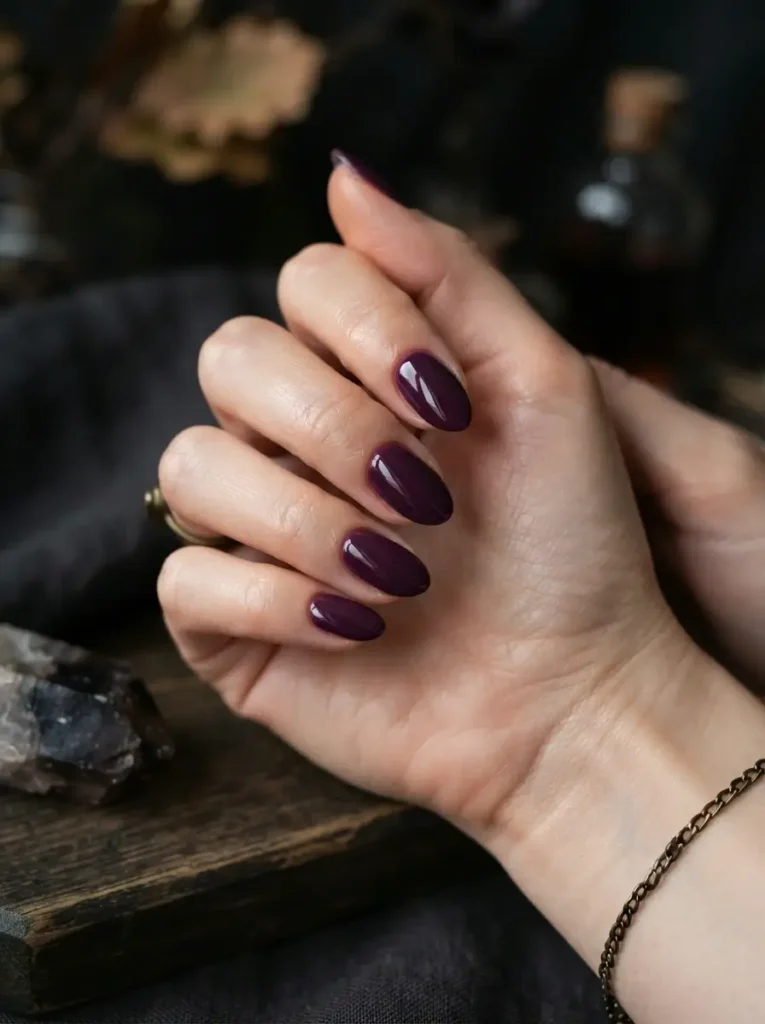 Halloween Nails 2026: 30+ Cute, Classy & Spooky Designs 17 deep plum almond classy Halloween nails