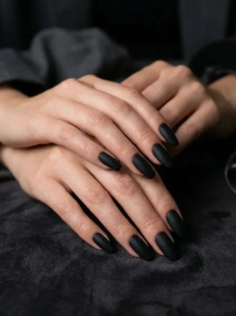 Halloween Nails 2026: 30+ Cute, Classy & Spooky Designs 14 classy matte black coffin Halloween nails